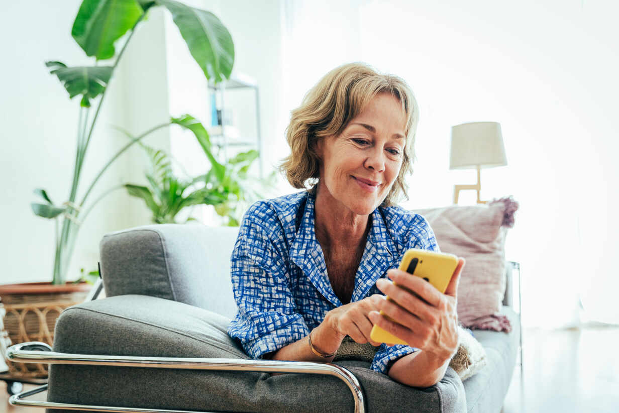 Person checking a clean health trends dashboard on a phone after exercising